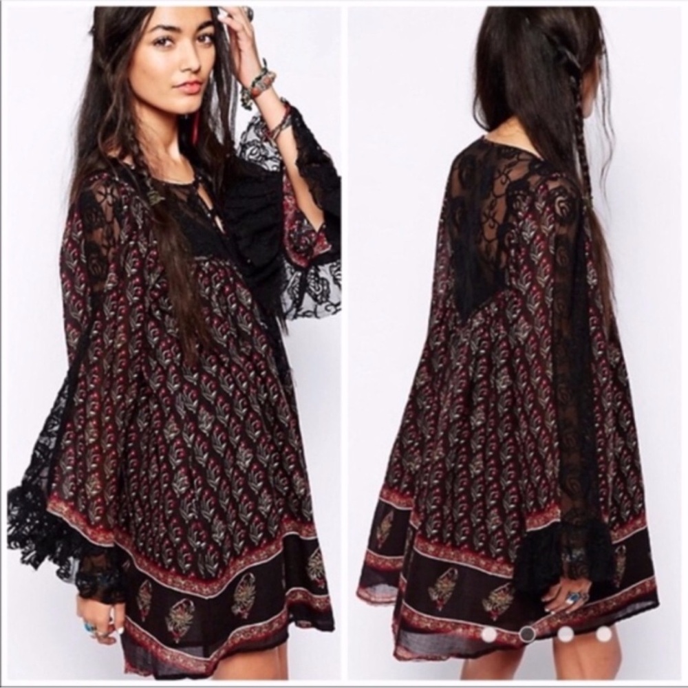 FP Nomad Child mini tunic dress in black floral print w lace & tassel detail